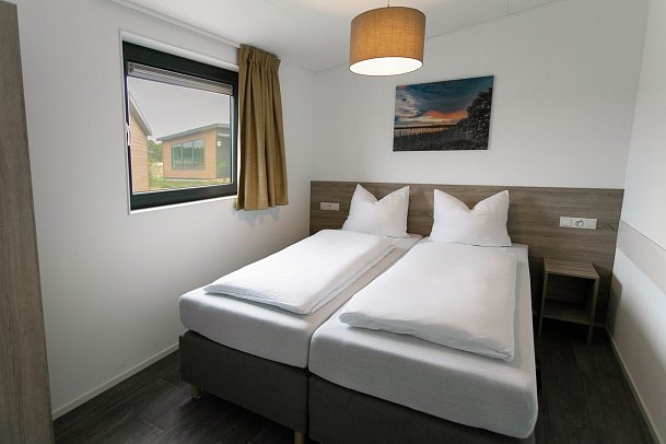 Tropical Islands Woodland Homes - Wohnbeispiel 4er Woodland Home (Zimmercodierung BB2)