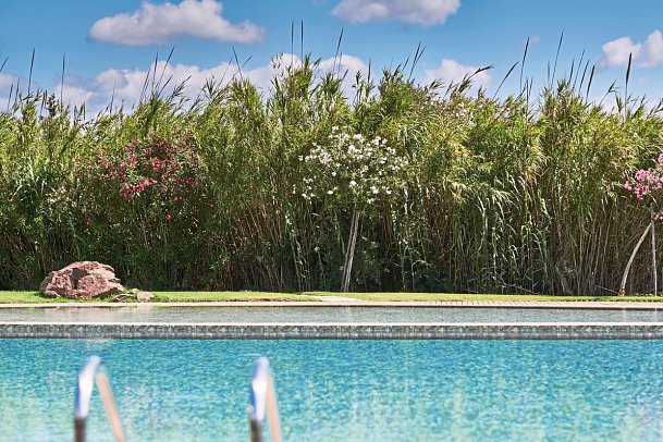 Baia di Chia Resort Sardinia, Curio Collection by Hilton