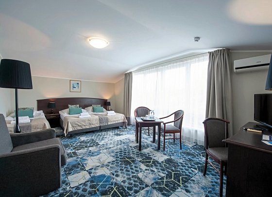 Sandra SPA Pogorzelica - Wohnbeispiel Familienzimmer Economy Classic im Gebäude Sandra (Zimmercodierung FE1)