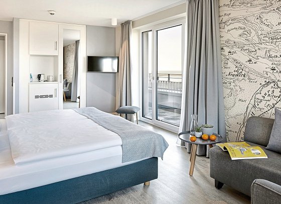 Küstenperle Strandhotel & Spa - Wohnbeispiel Familienzimmer mit seitlichem Meerblick (Zimmercodierung F3N)
