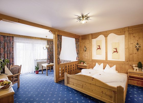 Bergidyll & Hotel Trofana - Wohnbeispiel Dreibettzimmer Gipfelstube (Zimmercodierung TF1)