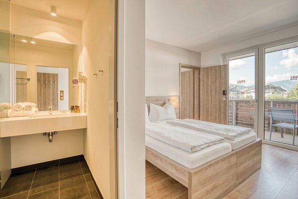 COOEE alpin Hotel Kitzbüheler Alpen - Wohnbeispiel Familienunterbringung (Zimmercodierung FB1)