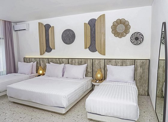 Jambuluwuk Oceano Resort Gili Trawangan - Wohnbeispiel Deluxe Garden Quadruple (Zimmercodierung UD4)
