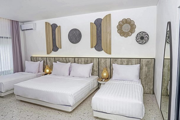 Jambuluwuk Oceano Resort Gili Trawangan - Wohnbeispiel Deluxe Garden Quadruple (Zimmercodierung UD4)