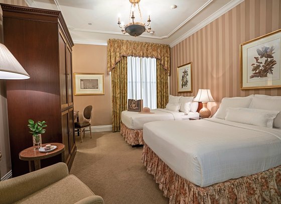 Hotel Monteleone - Wohnbeispiel Traditional Room 2 Double Beds (Zimmercodierung UG3)
