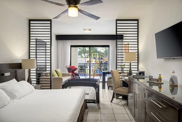 Ocean Coral & Turquesa - Wohnbeispiel Daisy Jr Suite Garden View (Zimmercodierung F1G)