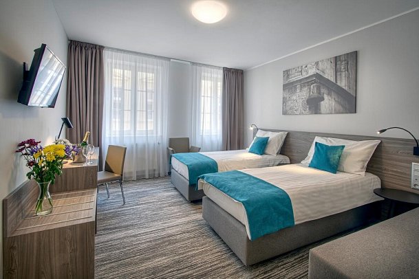 Hotel Páv - Wohnbeispiel Dreibettzimmer