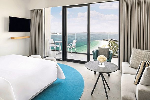 Mövenpick Resort Al Marjan Island - Wohnbeispiel Deluxe / Beach & Pool View Room (Zimmercodierung DMP)