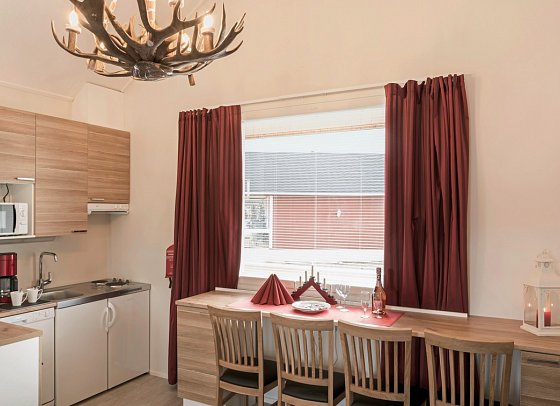 Santa Claus Holiday Village - Wohnbeispiel Superior Cottage B (Zimmercodierung SS1)