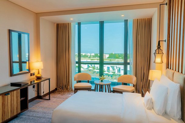 Millennium Resort Salalah - Wohnbeispiel Premium Pool View Balcony (Zimmercodierungen UM1, UM2 & UM3)