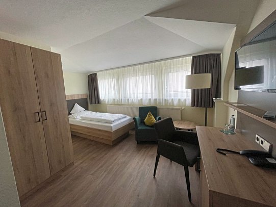 Hotel Niedersächsischer Hof - Wohnbeispiel Einzelzimmer Premium (Zimmercodierung EB1)