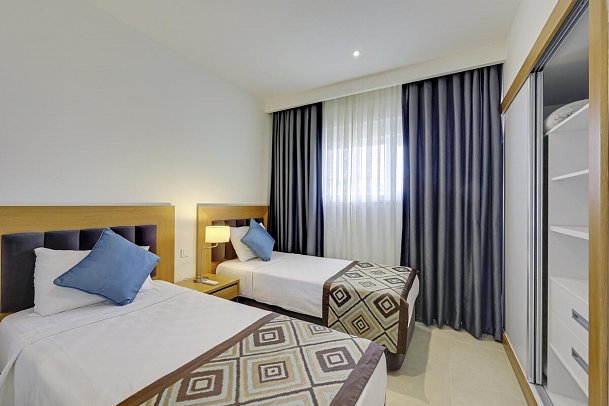 Ramada Hotel & Suites by Wyndham Kusadasi - Wohnbeispiel Suite Familie (Zimmercodierungen WI1 & WIM)