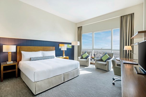 Grand Millennium Al Wahda - Wohnbeispiel Deluxe Room