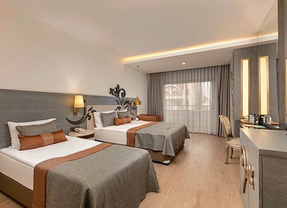 Kirman Belazur Resort & Spa - Wohnbeispiel Doppelzimmer seitl. Meerblick (Zimmercodierungen DBN & DCN)
