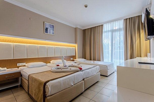 Incekum Su - Wohnbeispiel Doppelzimmer Gartenblick