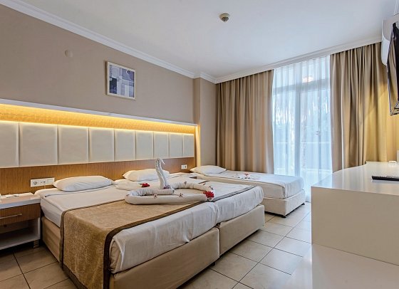 Incekum Su - Wohnbeispiel Doppelzimmer Gartenblick