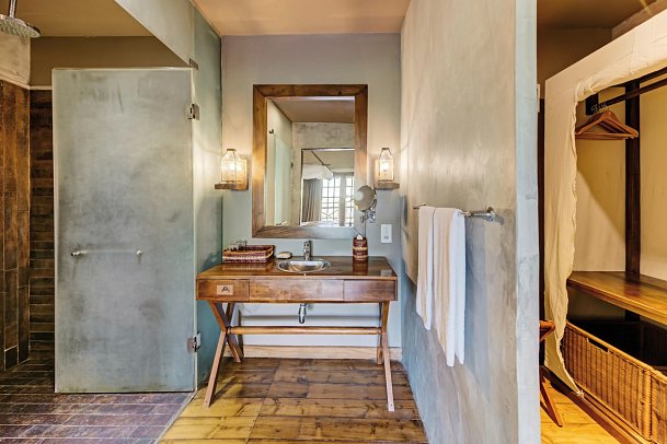 Cinnamon Wild Yala - Wohnbeispiel Bad Jungle Chalet (Zimmercodierung BB2)