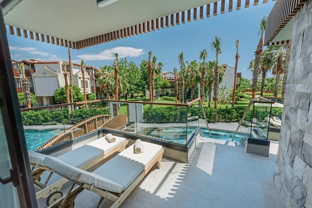 Club Tuana - Wohnbeispiel Doppelzimmer Lagoon Swim Up Poolzugang über Treppen (Zimmercodierung D1Q)