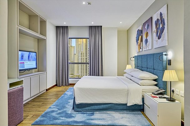 Ramada Hotel & Suites by Wyndham Dubai JBR - Wohnbeispiel One Bedroom King Suite City View (Zimmercodierung AB1)