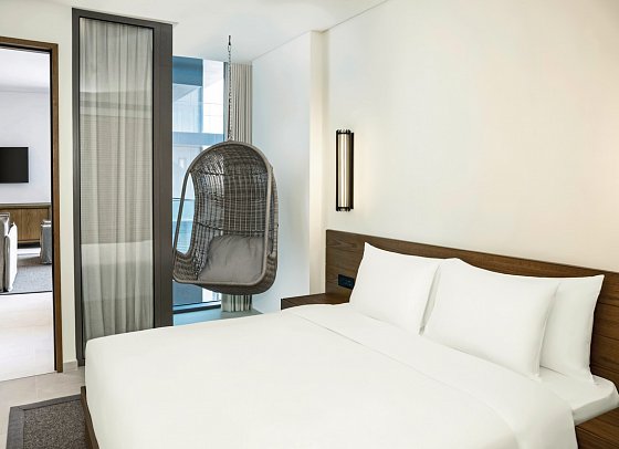 Radisson Beach Resort Palm Jumeirah - Wohnbeispiel One Bedroom Suite Partial Sea View (Zimmercodierung WBN)