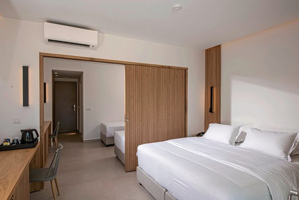 Gouves Water Park Holiday Resort - Wohnbeispiel Familiensuite Gemeinschaftspool (Zimmercodierung WI3)