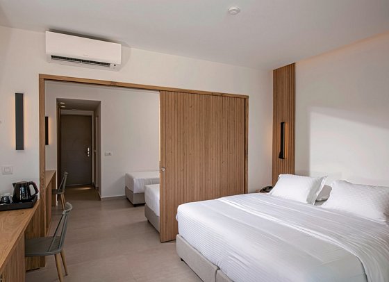 Gouves Water Park Holiday Resort - Wohnbeispiel Familiensuite Gemeinschaftspool (Zimmercodierung WI3)