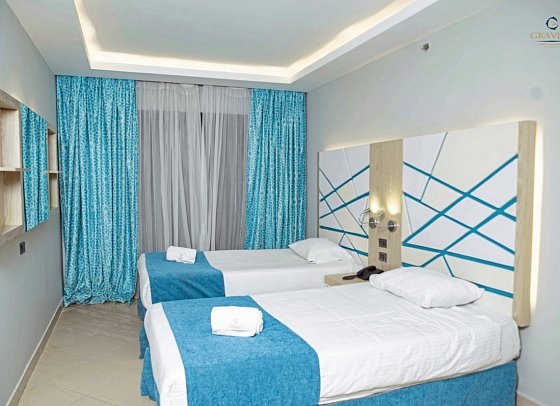 Gravity Hotel & Aqua Park Hurghada - Wohnbeispiel Familienzimmer Gartenblick (Zimmercodierung F1G)