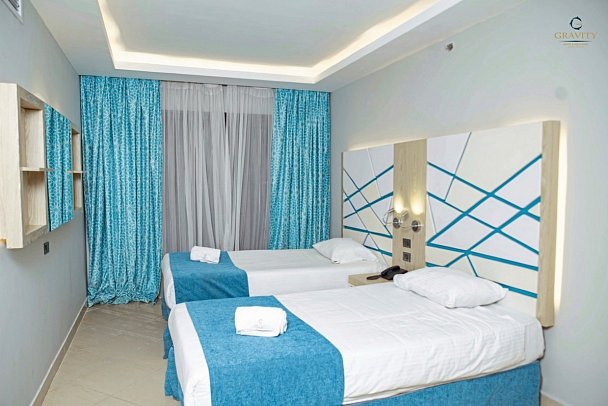 Gravity Hotel & Aqua Park Hurghada - Wohnbeispiel Familienzimmer Gartenblick (Zimmercodierung F1G)