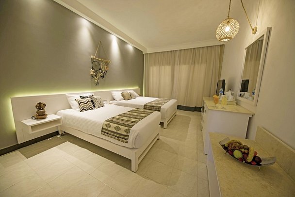 Meraki Resort - Wohnbeispiel Dreibettzimmer Gartenblick Triple Trouble (Zimmercodierung TBG)