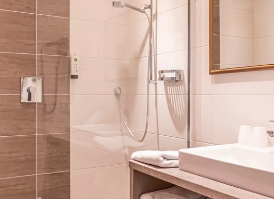 Ferienclub Bellevue am Walchsee - Beispiel Bad Appartement Bergseite (Zimmercodierung AB1)