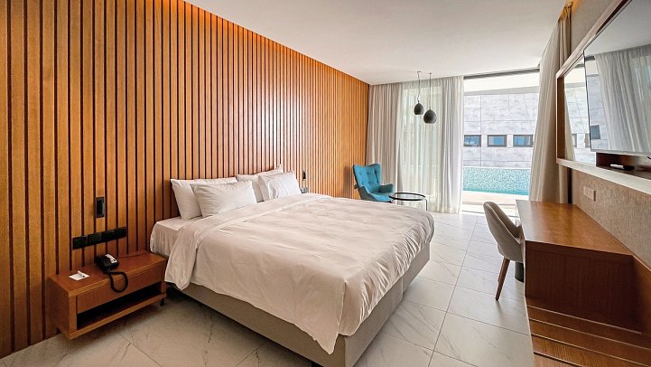 Radisson Beach Resort - Wohnbeispiel Doppelzimmer Premium Swim-Up (Zimmercodierung DMQ)