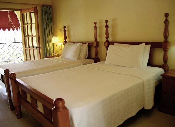 Charela Inn Hotel - Wohnbeispiel Standard Gardenview (Zimmercodierung UGG)
