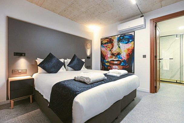 Grands Suites Hotel Residences & Spa - Wohnbeispiel One Bedroom Suite-Urban View (Zimmercodierung AT1)