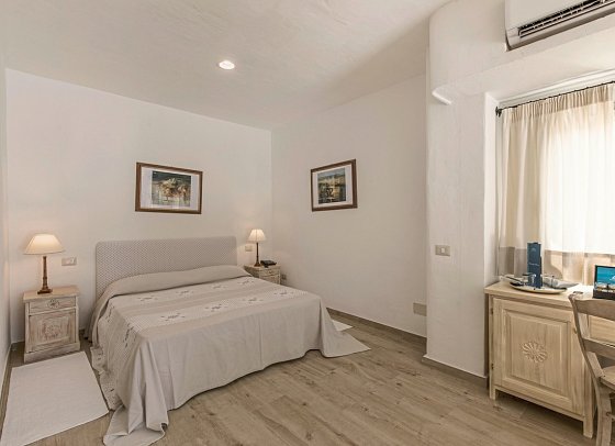 Grand Relais dei Nuraghi - Wohneispiel Juniorsuite Garten und Privatpool (Zimmercodierung J1R)