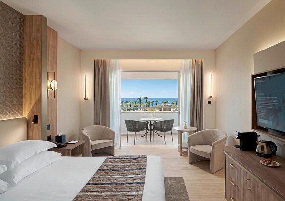 Olympic Lagoon Resort Paphos - Wohnbeispiel Doppelzimmer Deluxe Pool- und Meerblick (Zimmercodierung DDM)