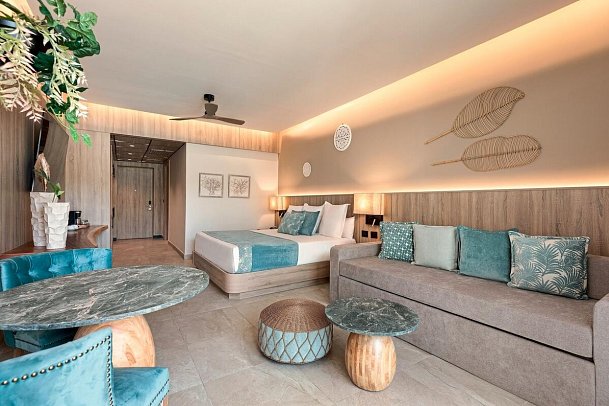 Serenade Caribe Club Family Beach Resort - Wohnbeispiel Luxury Garden View (Zimmercodierung UUG)