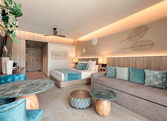 Serenade Caribe Club Family Beach Resort - Wohnbeispiel Luxury Garden View (Zimmercodierung UUG)