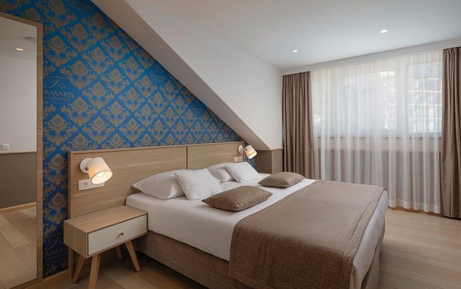 Tamaris Aparthotel - Wohnbeispiel DZ Economy Bergblick (Zimmercodierungen DEB & DC1)