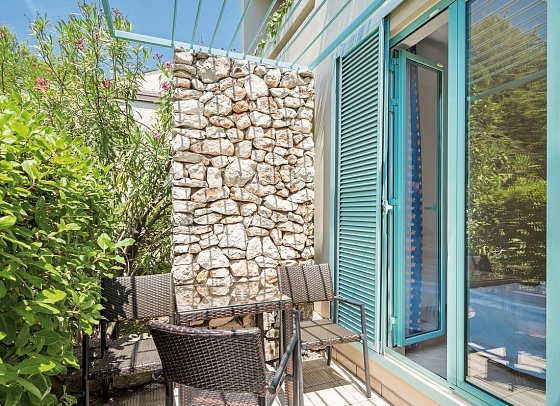 Bretanide Sport & Wellness Resort - Wohnbeispiel Terrasse Familienzimmer (Zimmercodierungen FB1 & FB2)