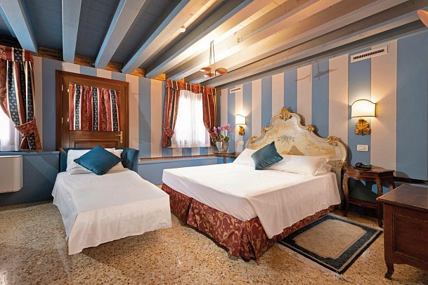 Hotel Tiziano - Wohnbeispiel Dreibettzimmer (Zimmercodierung TB1)