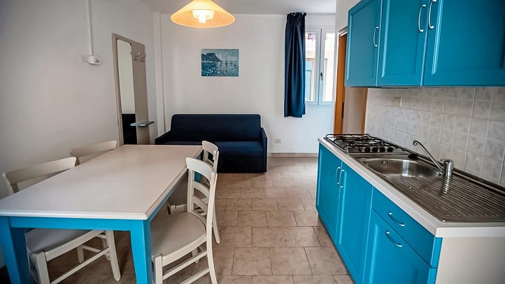 Camping Village Bella Italia - Wohnbeispiel 2-Zimmer-Appartement Primula (Zimmercodierung AB2)