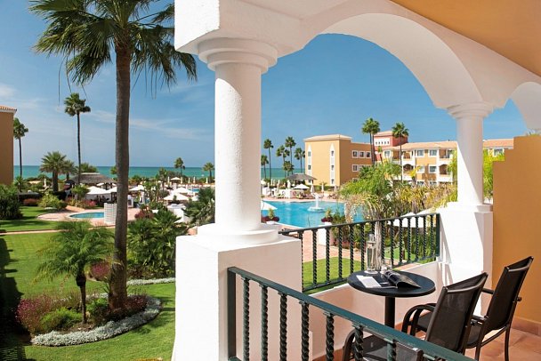 Palacio de Sancti Petri, A Gran Meliá Hotel - Balkon-/Blickbeispiel Doppelzimmer Premium Meerblick (Zimmercodierungen DMM & DM2)