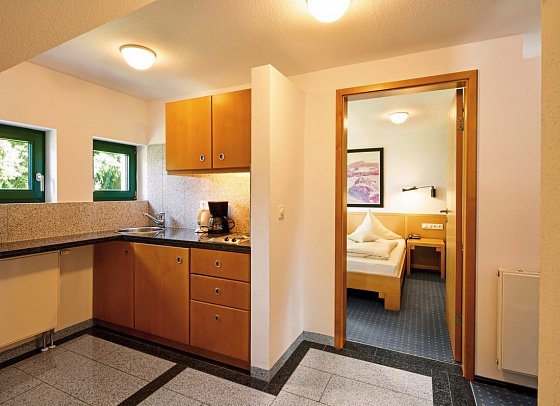 Hotel Gersfelder Hof - Wohnbeispiel Appartement 1 Schlafzimmer Familie (Zimmercodierung AB1)