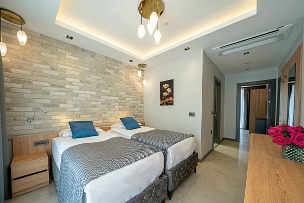 Batihan Vadi Hotel - Wohnbeispiel Familiensuite (Zimmercodierungen WI1 & UC1)