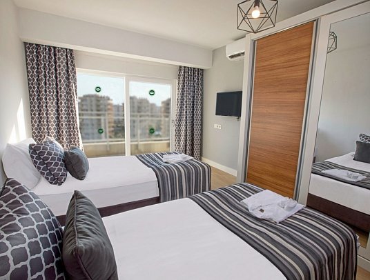 Greenwood Suites Resort - Wohnbeispiel Deluxe Suite (Zimmercodierung WDL)