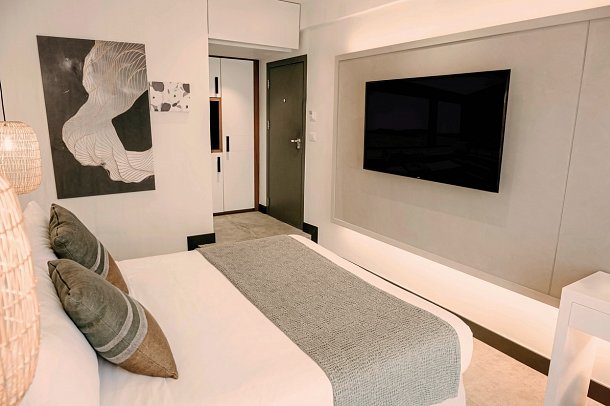 Domes Aulus Elounda, Curio Collection by Hilton - Wohnbeispiel Doppelzimmer Meerblick Sapphire Cozy Nest (Zimmercodierung DBM)