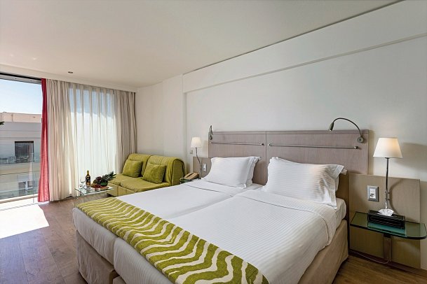 Kriti Beach Hotel - Wohnbeispiel Juniorsuite seitl. Meerblick (Zimmercodierung J1N)