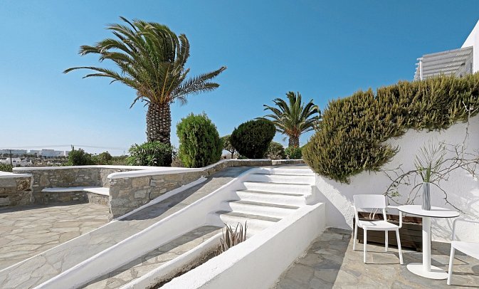 Boutiquehotel Andronikos - Wohnbeispiel Juniorsuite Gartenblick (Zimmercodierung JBG)