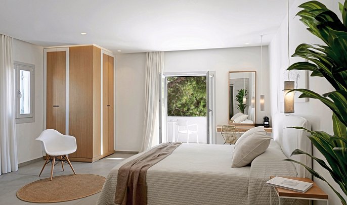 Boutiquehotel Andronikos - Wohnbeispiel Juniorsuite Gartenblick (Zimmercodierung JBG)