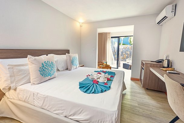 Villas Caroline - Wohnbeispiel Standard Economy Gardenview (Zimmercodierung UB1)